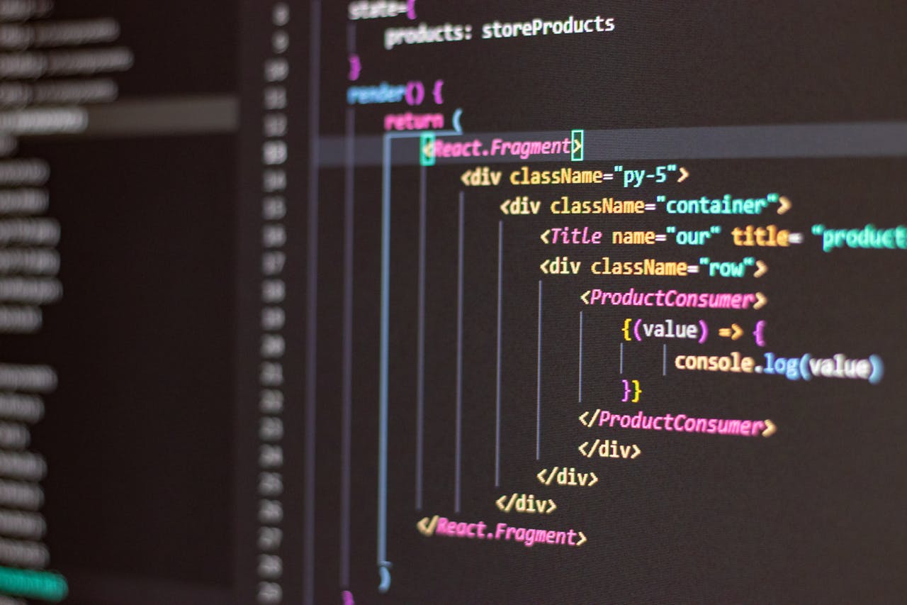 Crafting Captivating Headlines: Your awesome post title goes here Close-up of HTML and JavaScript code on a computer screen in Visual Studio Code.